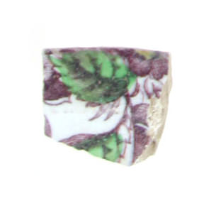 A fragment of purple transfer printed whiteware found at House B.